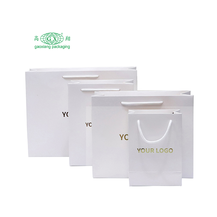 Custom shopping bags clothing gold printed logo design white cardboard paper packaging bags for retail