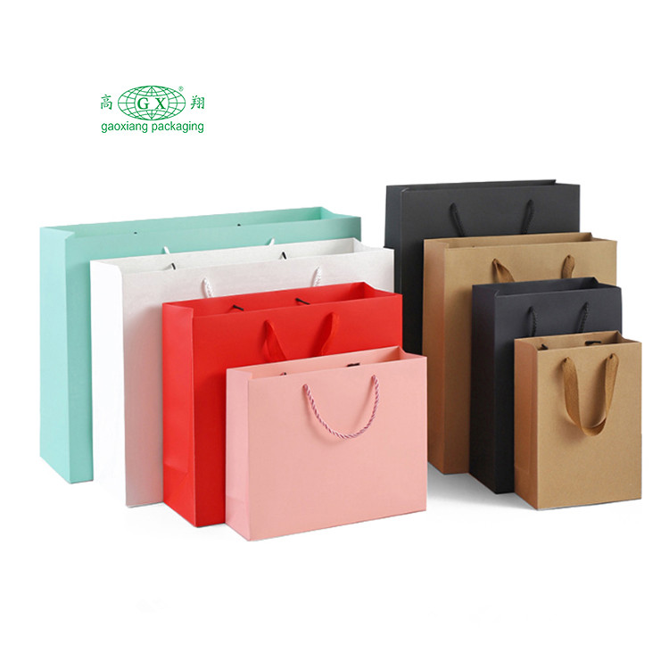 Wholesale custom pink black white luxury kraft paper shopping bags with logo