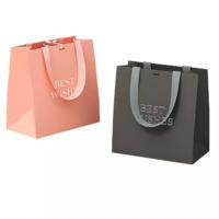 Newest foldable birthday gift ribbon handle black paper bags for boutique gift packaging